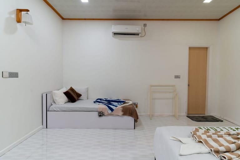 Single sofa bed in the living area — the sixth sleeping spot