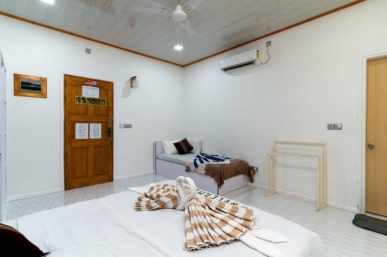 Bedroom 1: double bed and single bed — sleeps three, the family room
