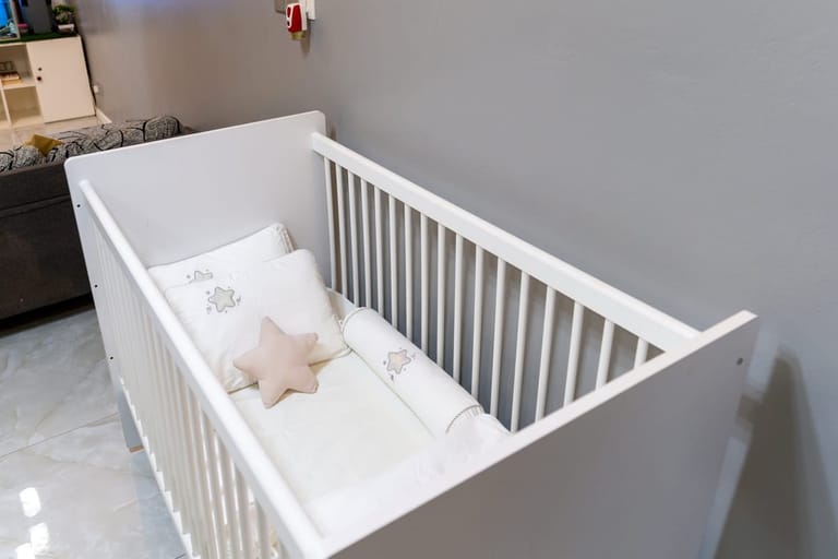 Travel cot with linen ready — mention it when you message and it will be waiting
